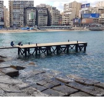 Timber jetty extending into the sea along the Alexandria corniche